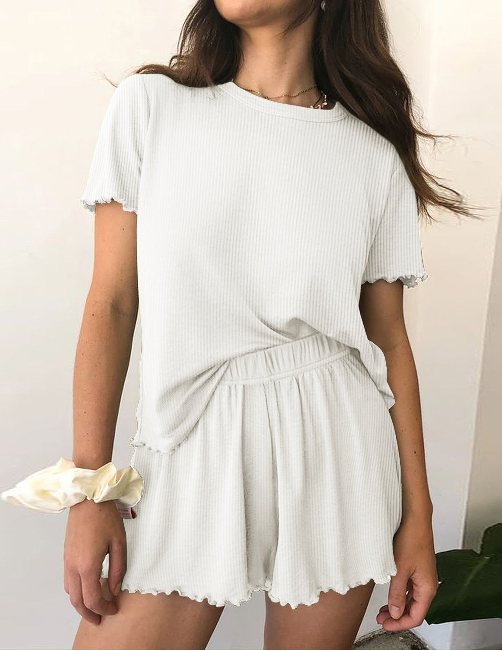 Ribbed knit pajama set in white, short-sleeve top and matching elastic-waist shorts