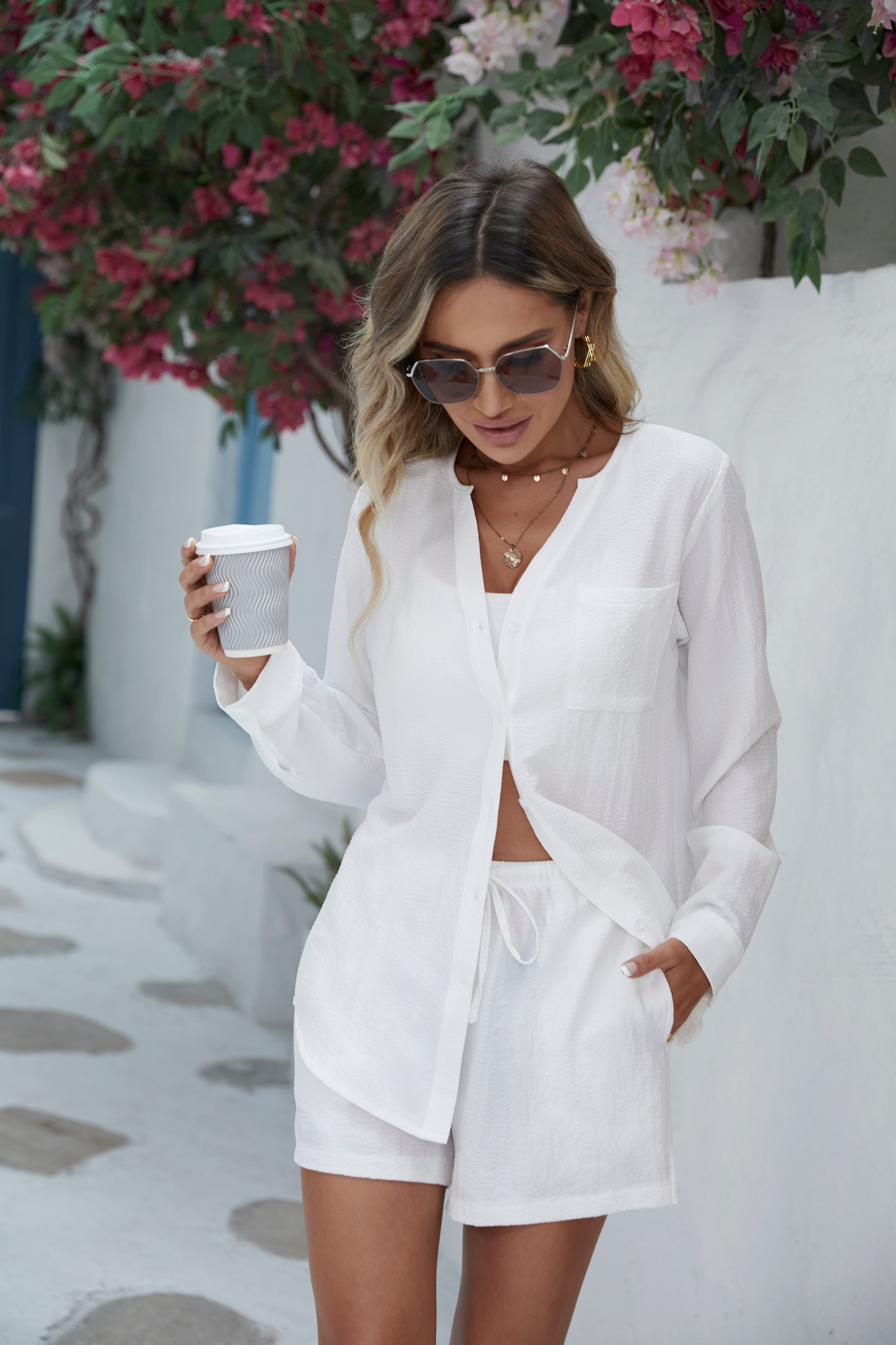 White bubble crepe 2-piece outfit: button-front long-sleeve top and matching shorts
