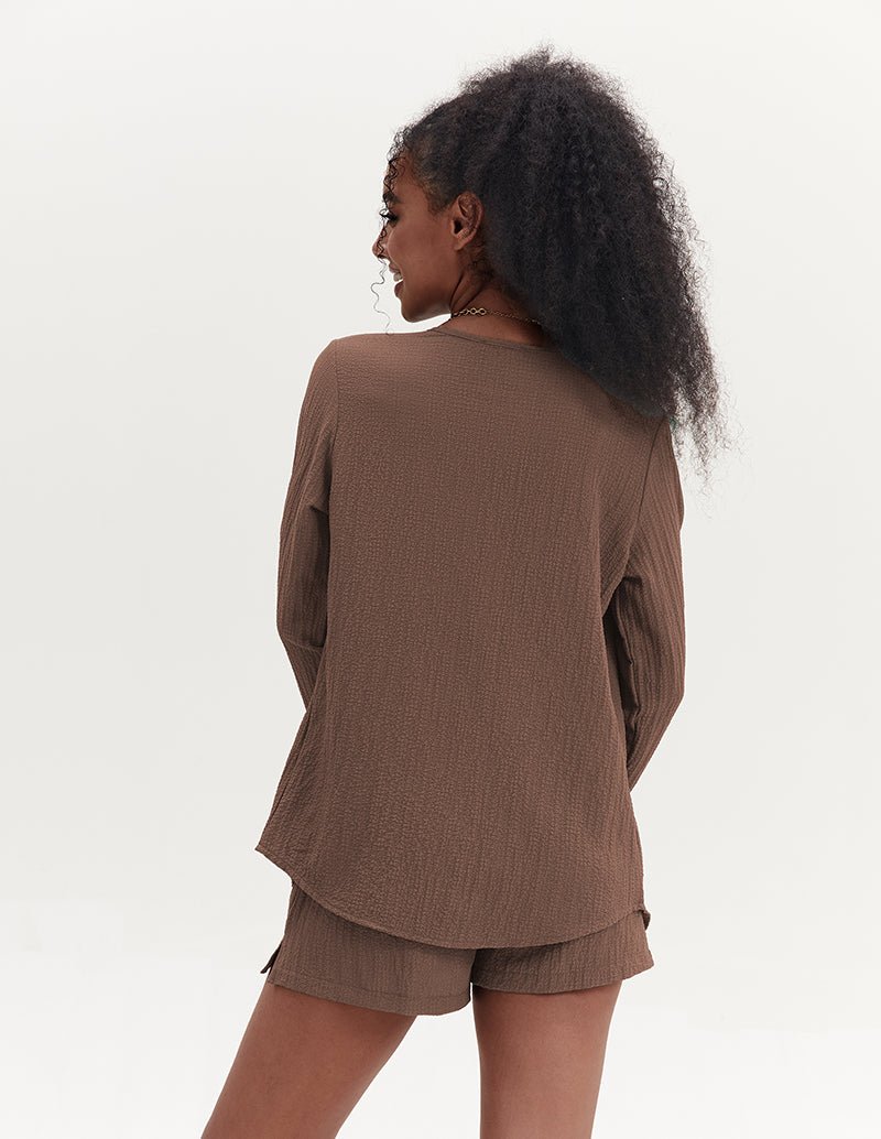 Brown bubble crepe 2-piece outfit, long-sleeve button top with matching shorts (back view)