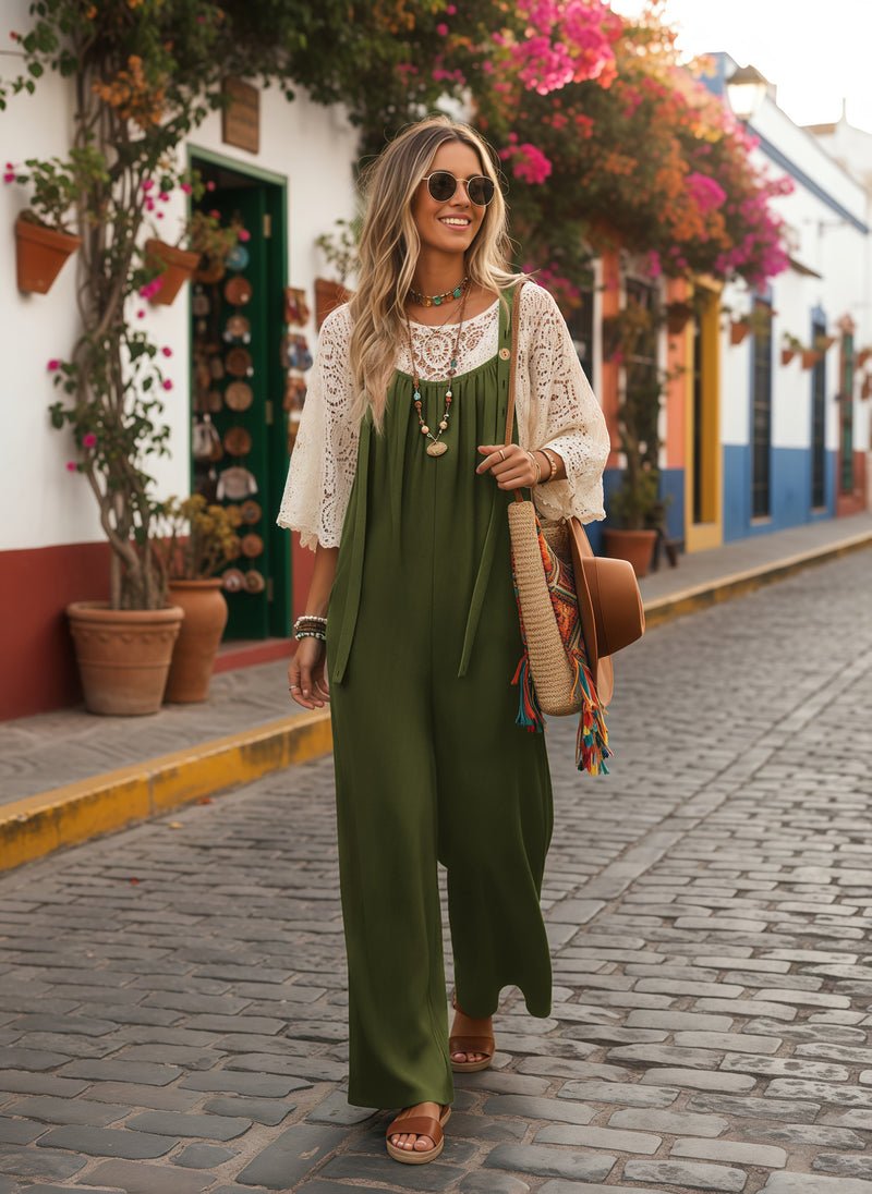 Olive green boho jumpsuit with tie waist and sleeveless design, paired with lace overlay