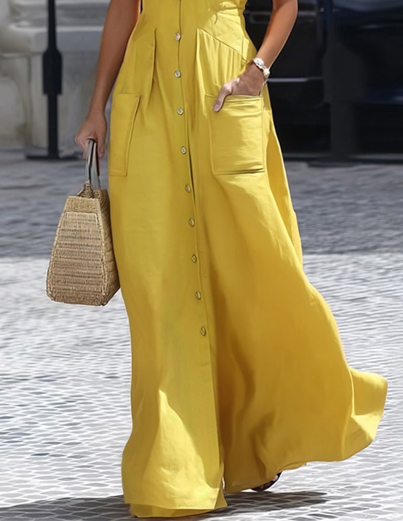 Yellow maxi shirt dress showing button-front placket and side pockets; short sleeves.