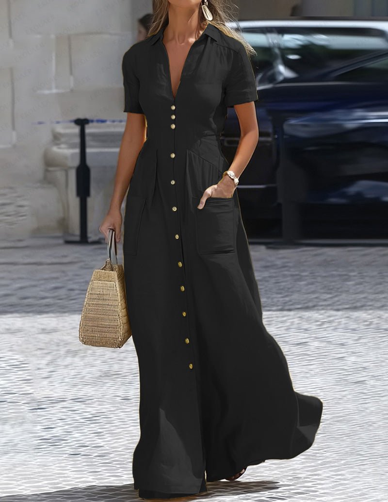 Black maxi shirt dress with collar, short sleeves, and button-front; side pockets.