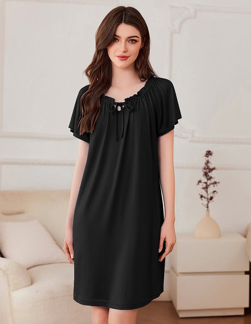 Short-sleeve dress in black with gathered neckline and bow-tie detail