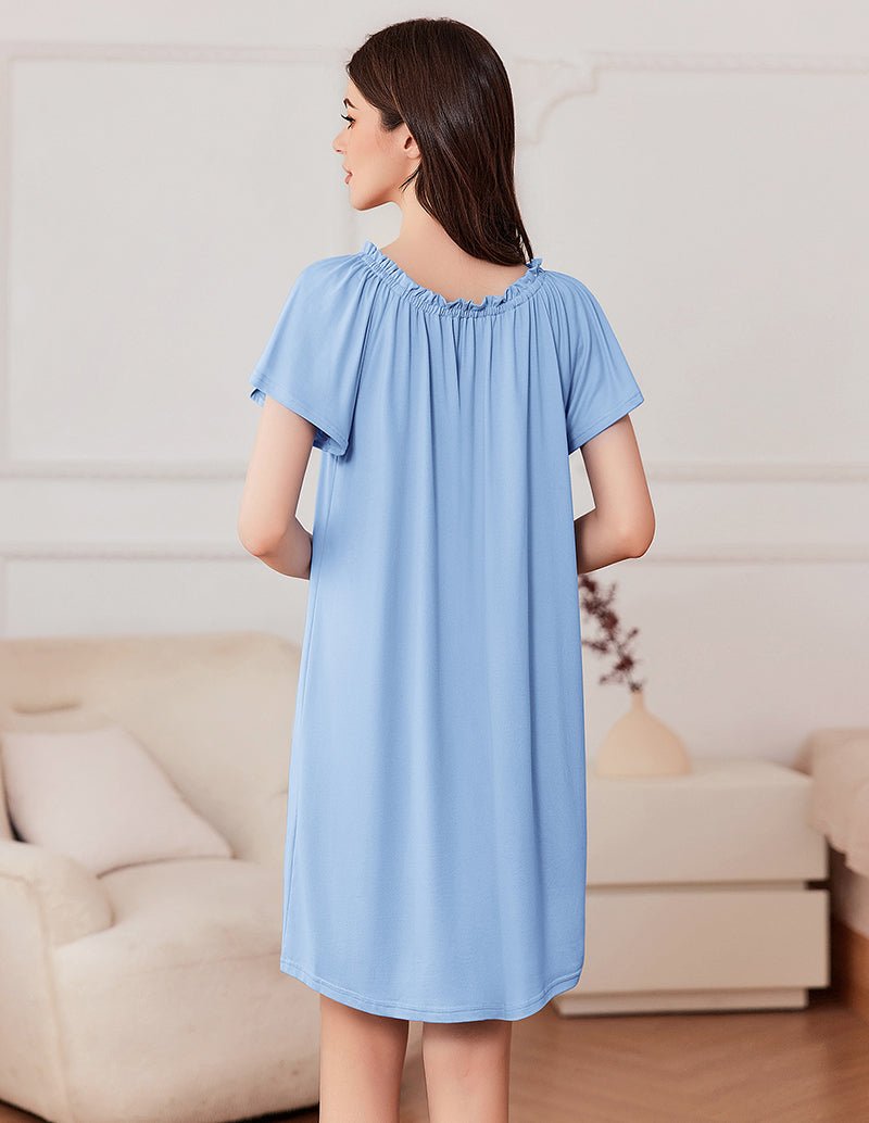 Casual short sleeve pleated dress, light blue back view with gathered yoke and pleats.