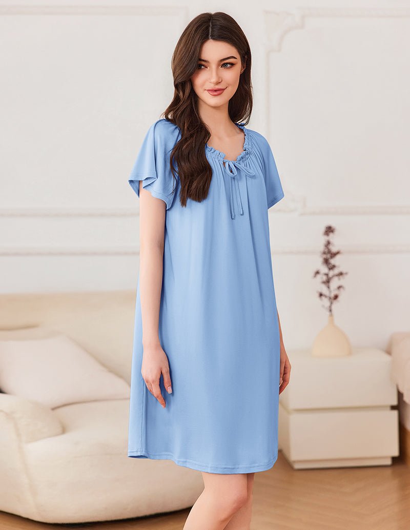 Casual short sleeve pleated dress, light blue with gathered tie neckline and short sleeves.