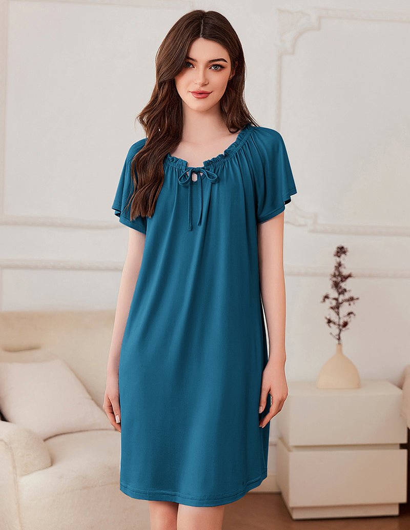 Short-sleeve dress in teal with gathered neckline and bow-tie detail