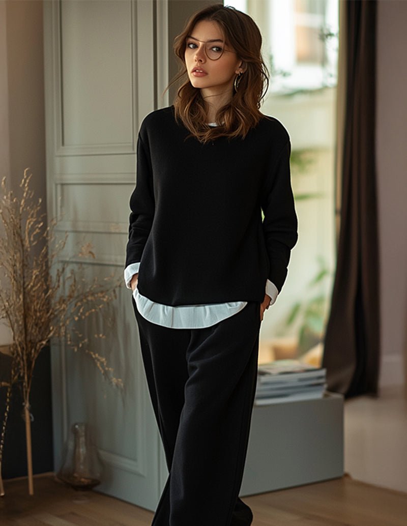 Black lounge set with long-sleeve pullover and matching joggers