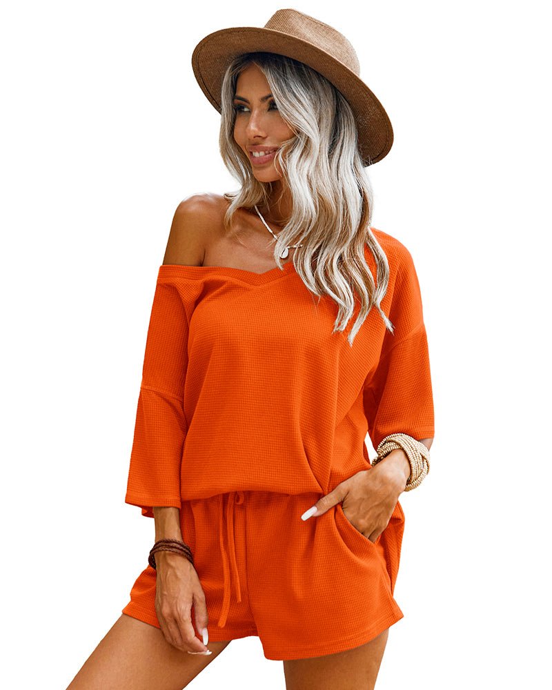 Orange waffle-knit off-shoulder 2-piece: top and drawstring shorts
