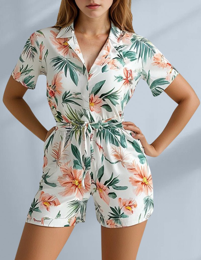 Pink and green floral pajama romper set with short sleeves and tied waist