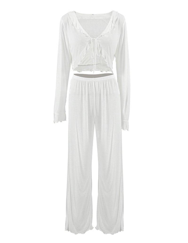 White two-piece pajama set: long-sleeve tie-front top with matching wide-leg pants