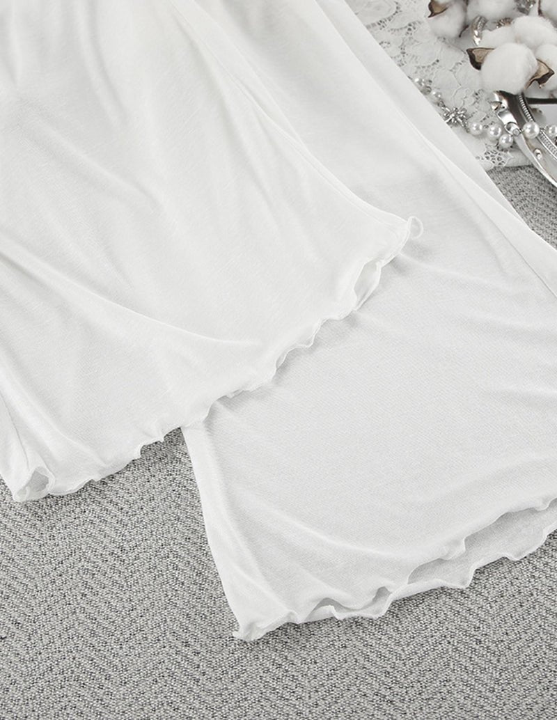 White pajama shorts and top set with ruffled edges and elastic waistband