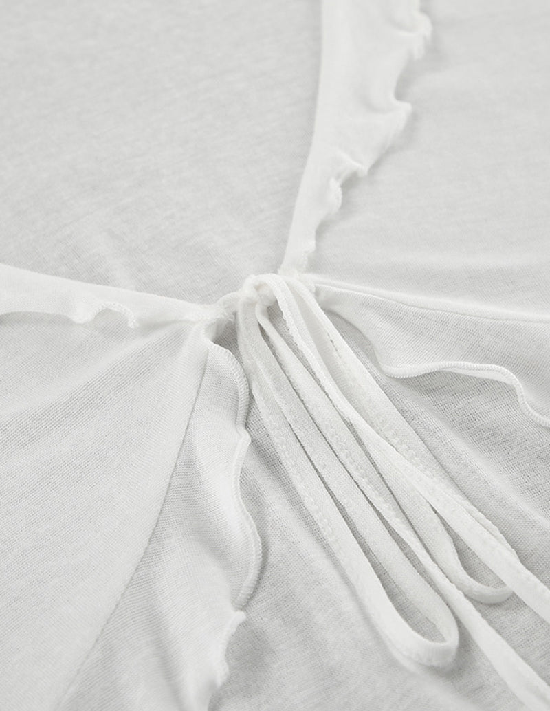 White pajama top neckline tie with long drawstrings and soft ruffled edge