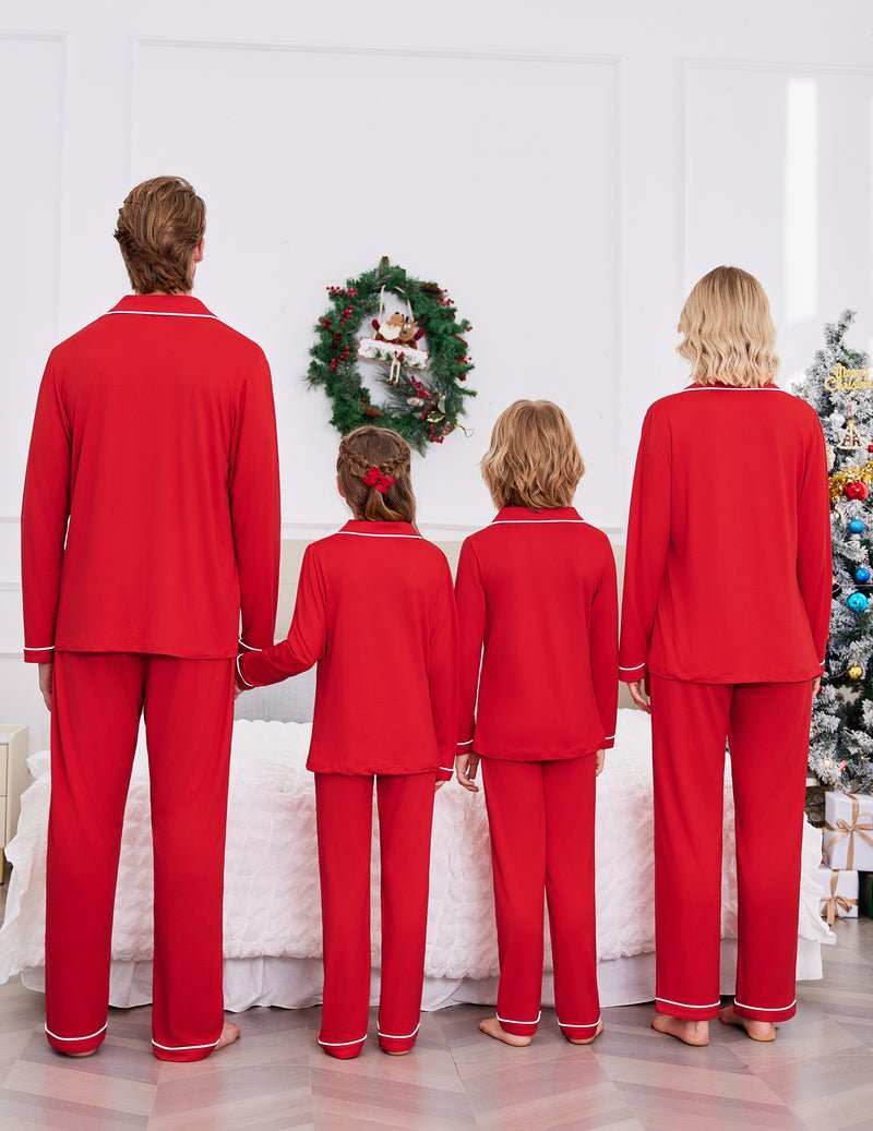 Back view of red long-sleeve family pajama set with contrast white piping