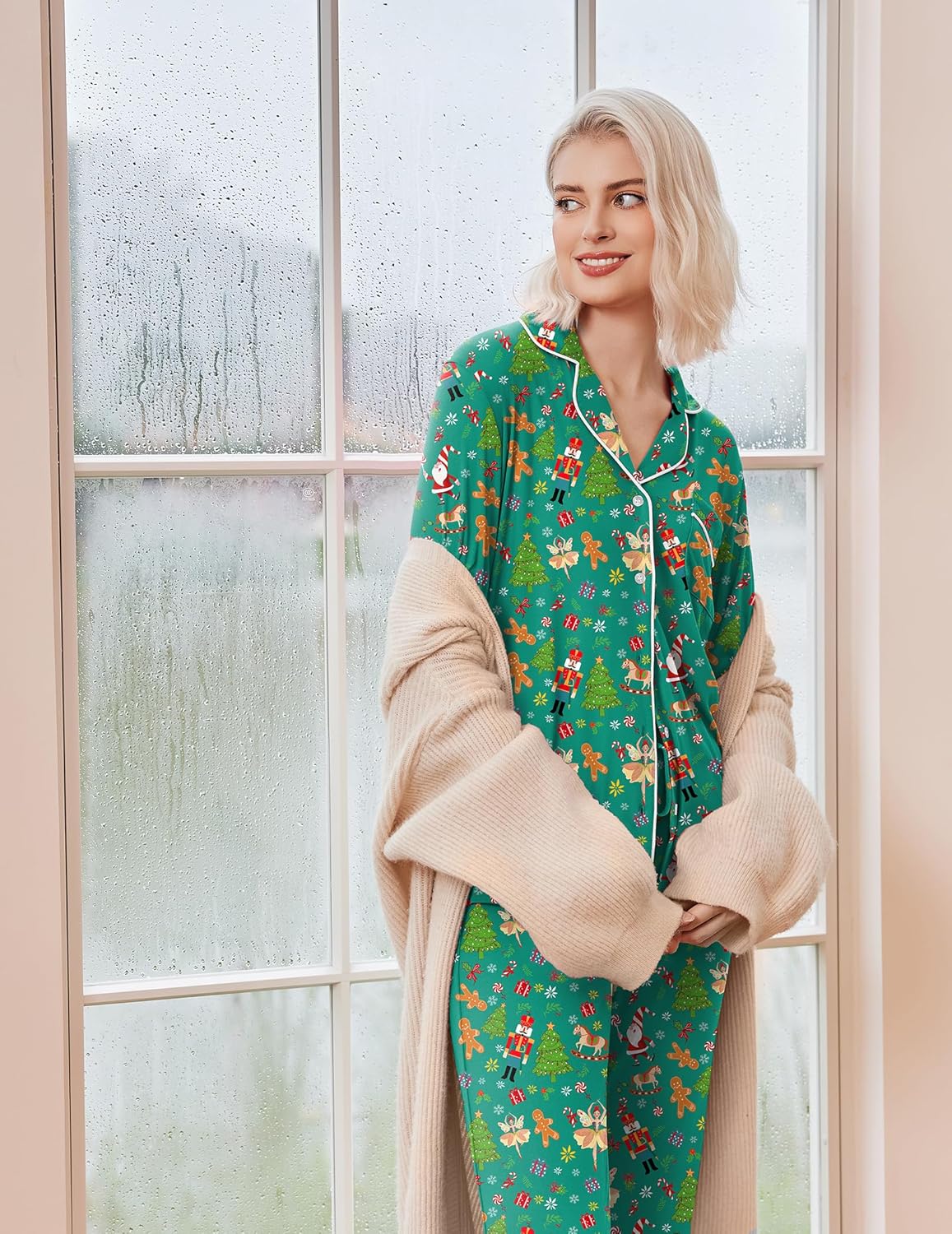 Long-sleeve green Christmas pajama set with festive characters print, button-front top