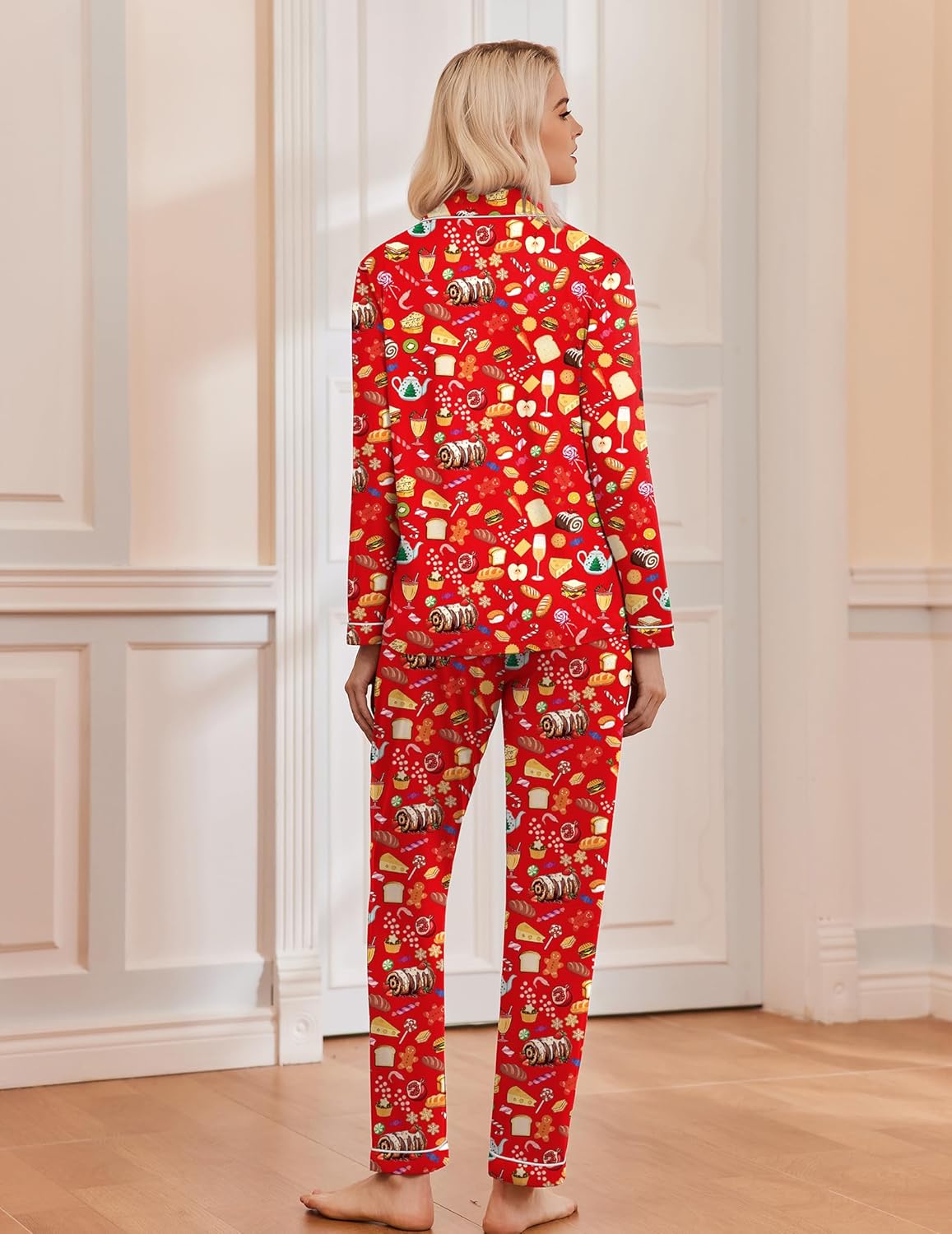 Red Christmas pajama set, back view, long sleeves with all-over toy print on top and pants