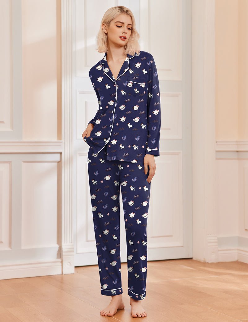 Long-sleeve navy Christmas pajama set with festive character print, matching straight-leg pants