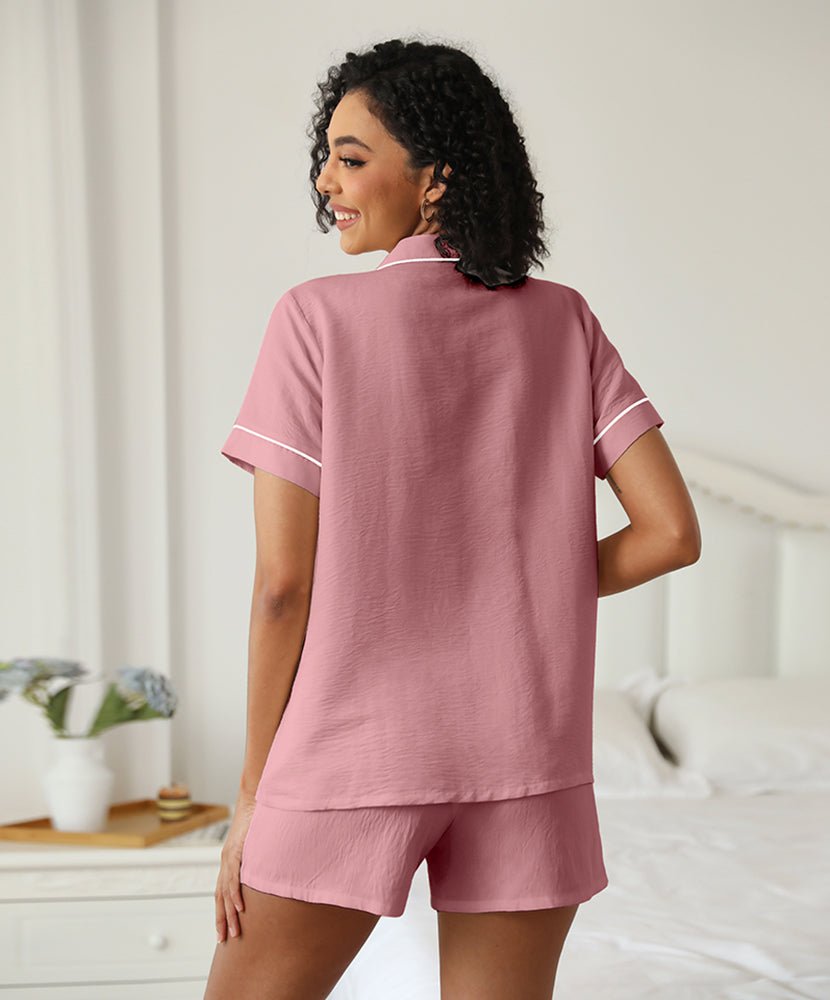 Light pink short-sleeve pajama set with drawstring-waist shorts, back view.