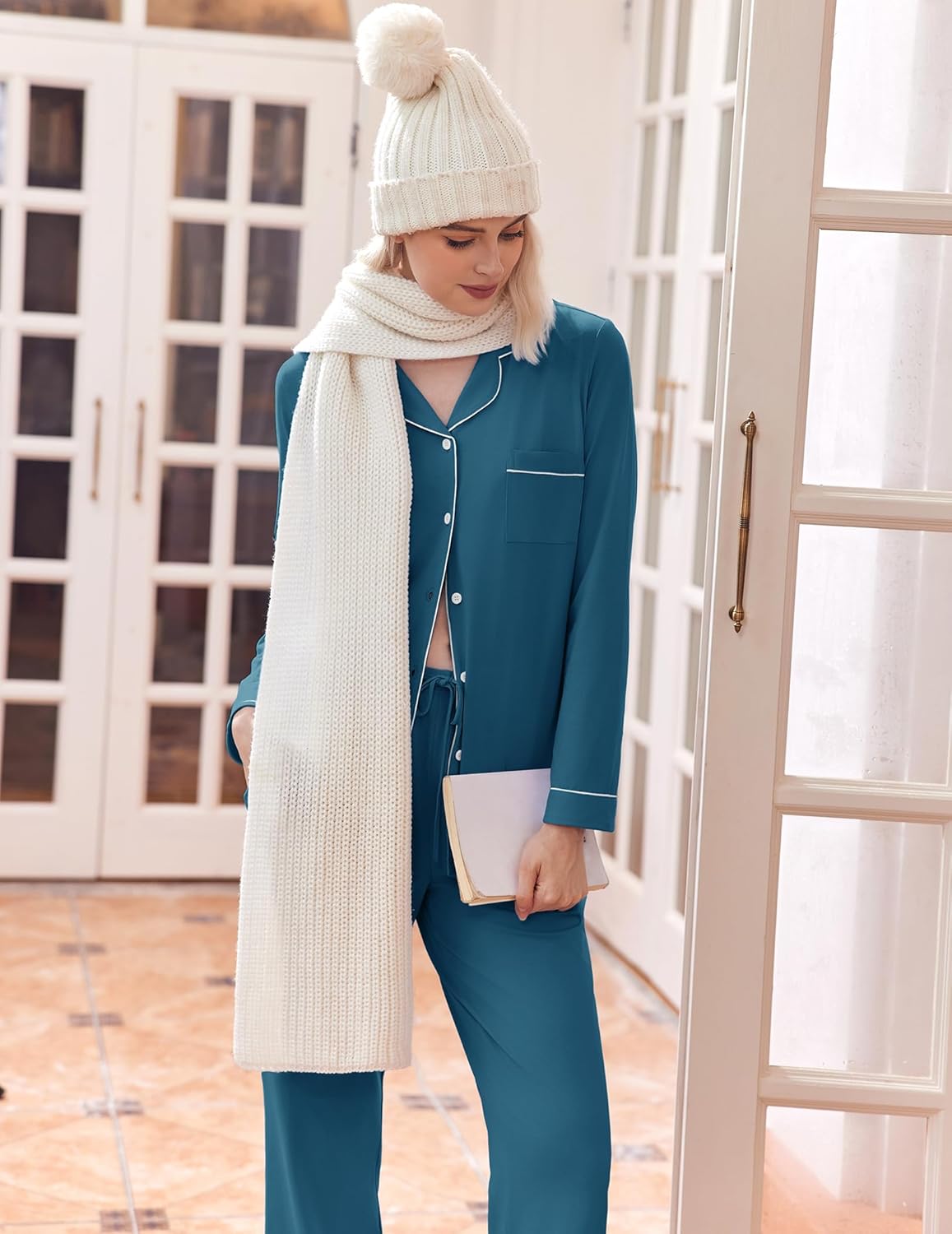 Teal pajama set with button-up shirt and long pants, contrast piping at seams