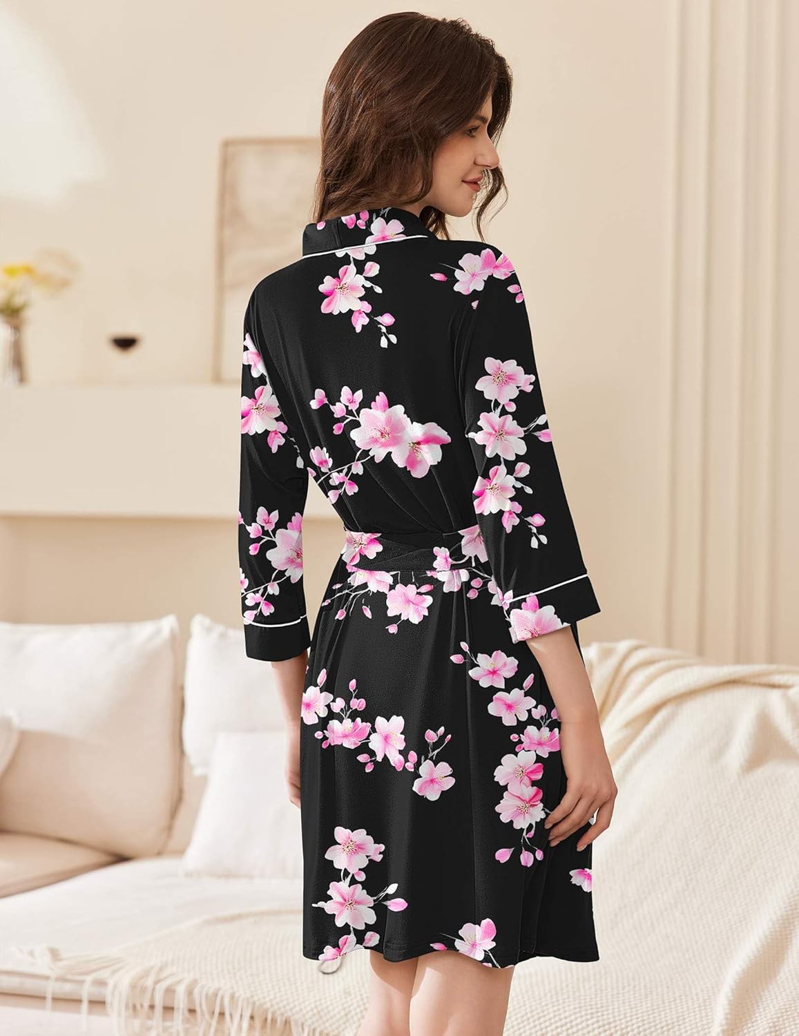 Black short kimono robe with pink floral print, shawl collar and tie belt