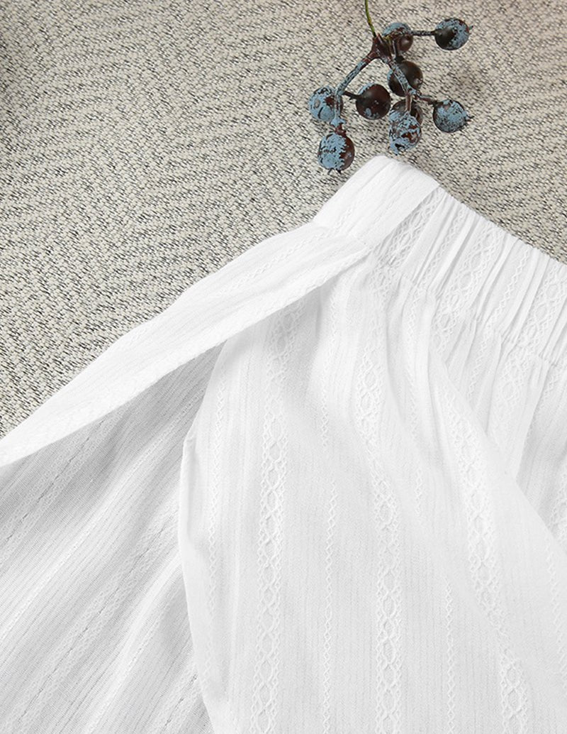 White cotton jacquard pleated mini shorts with elastic waistband detail