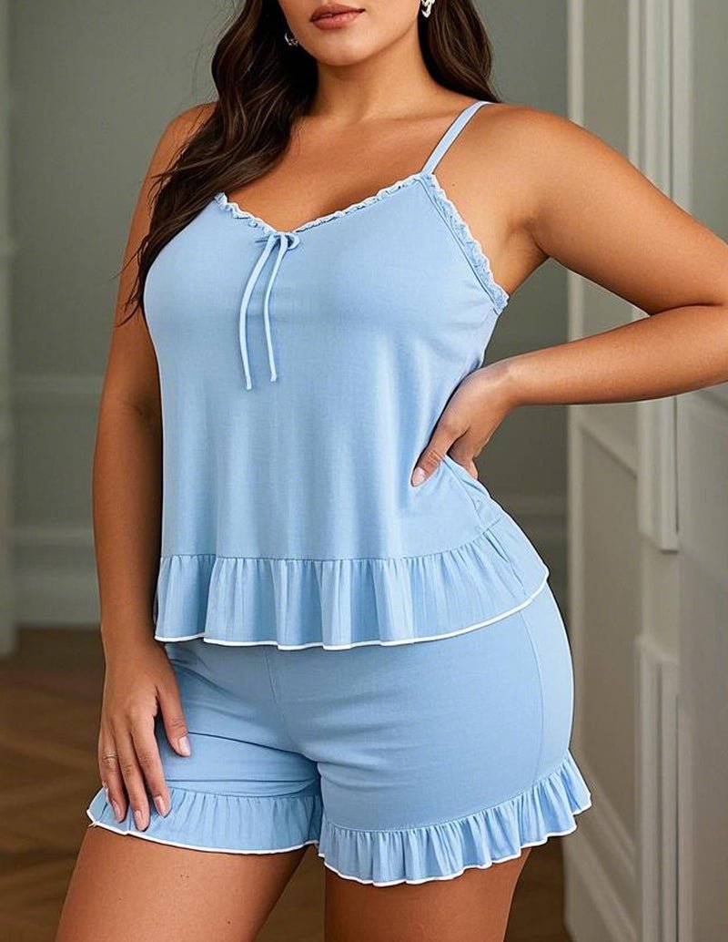 Blue cami pajama set with lace-trim neckline, tie straps, and ruffle shorts