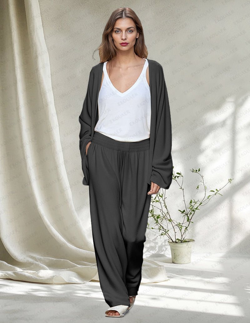 Black 2-piece lounge set with white V-neck tank, dark cardigan, and drapey pants