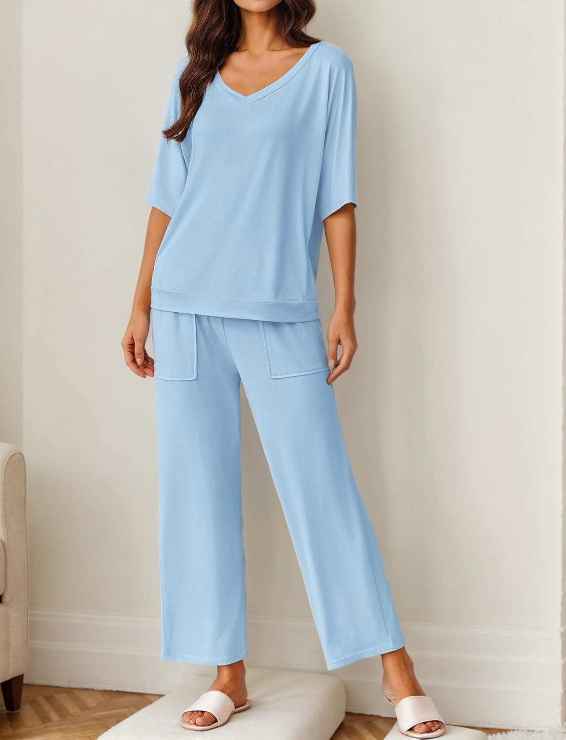 Clear blue pajama set with short-sleeve V-neck top and wide-leg pants, side pockets