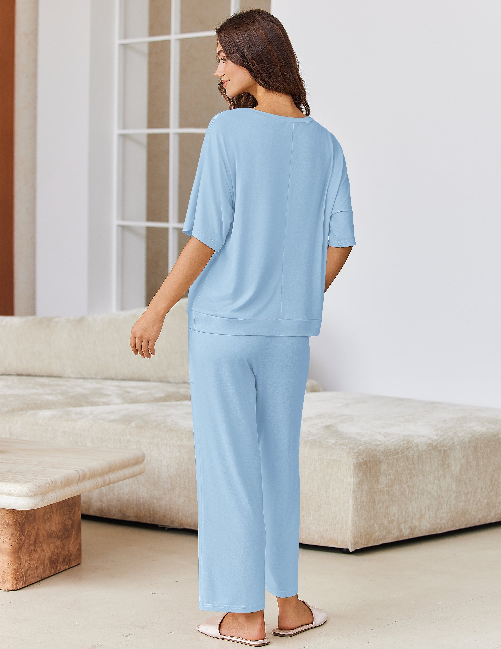 Light blue short-sleeve pajama top with relaxed wide-leg pants, back view