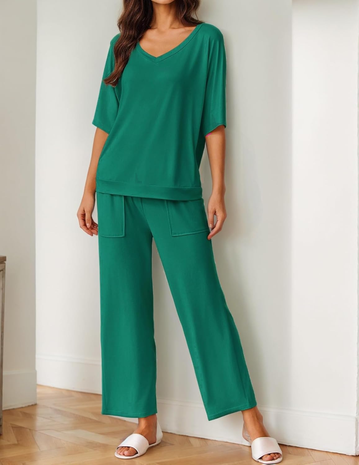 Deep green pajama set with short-sleeve V-neck top and wide-leg pants, patch pockets