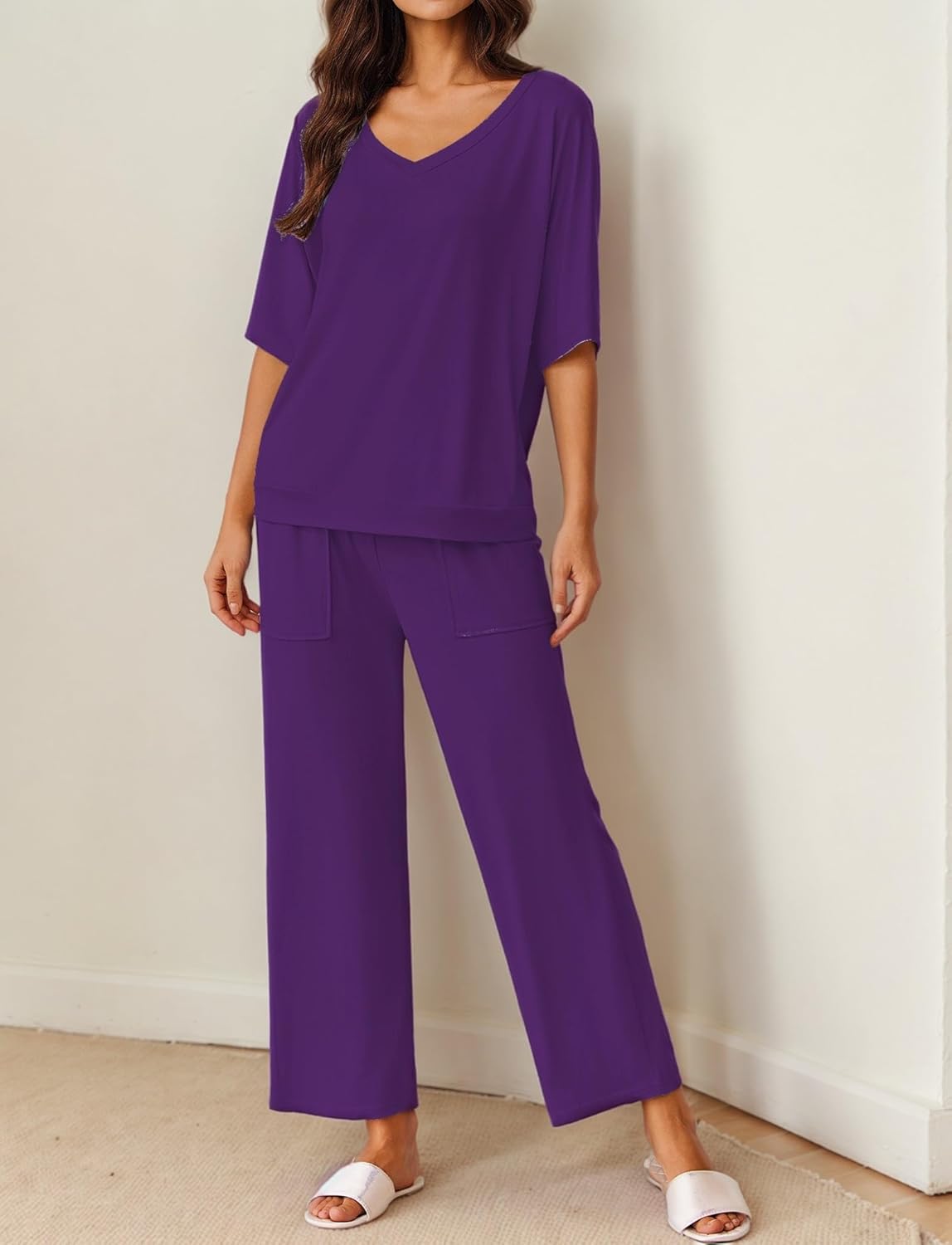 Purple pajama set with short-sleeve V-neck top and wide-leg pants, patch pockets