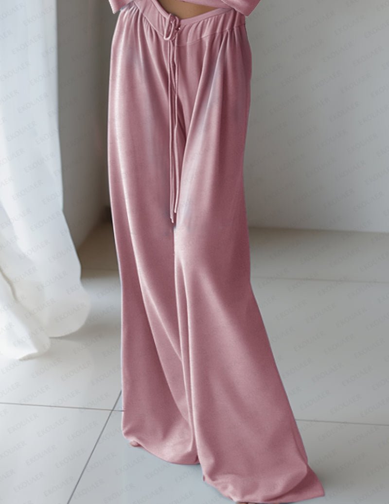 Pink wide-leg lounge pants with elastic waist and drawstring, part of 2-piece set