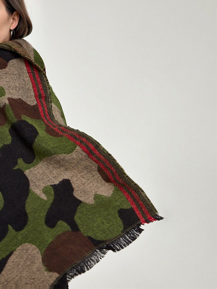 Camo shawl scarf close-up with red-striped border and fringed edge