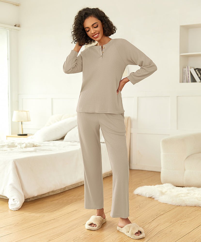 Beige waffle-knit pajama set with quarter-zip top and straight-leg pants