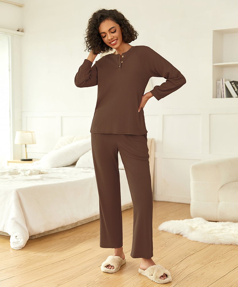 Brown waffle-knit pajama set with quarter-zip top and straight-leg pants