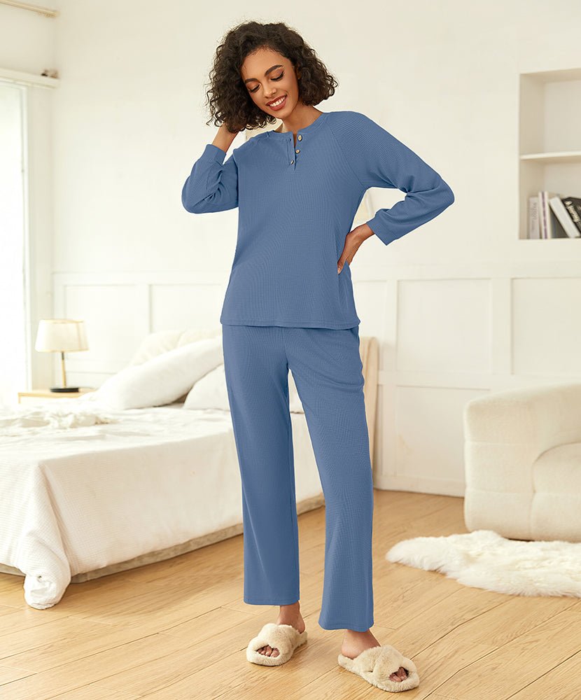 Light blue waffle-knit pajama set with quarter-zip top and straight-leg pants