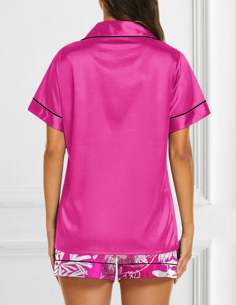 Pink satin pajama set back view: short-sleeve button-up and floral print shorts.
