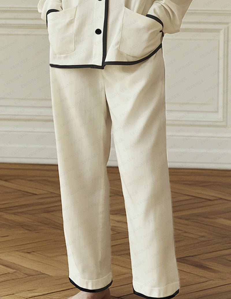Beige cotton pajama pants with contrast-trim cuffs and straight leg