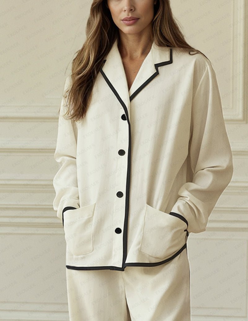 Beige cotton pajama top with contrast trim, button front, and chest pockets