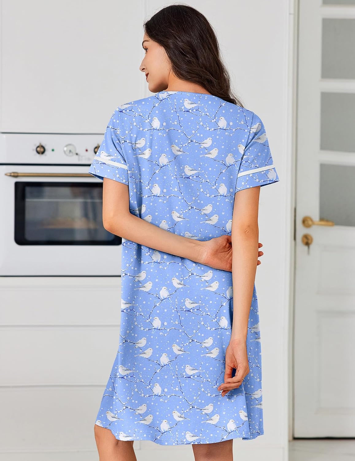 Back view of cotton button-front nightgown with pockets, light blue bird print