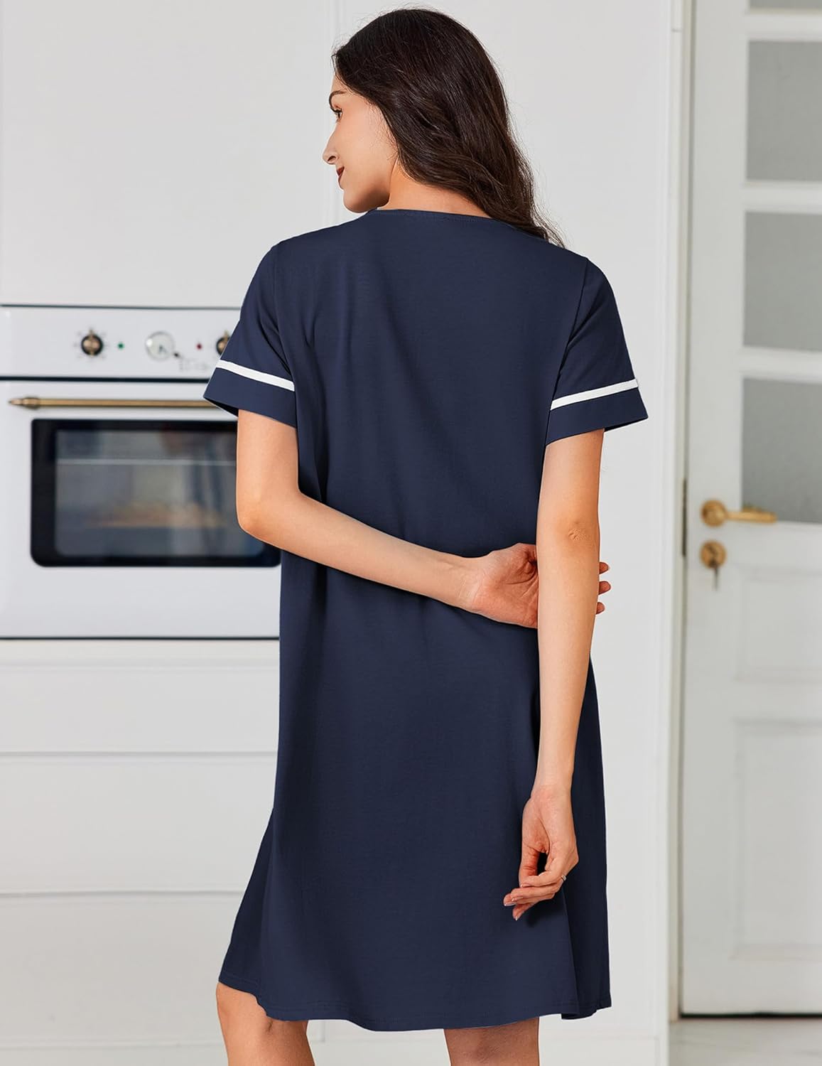 Back view of cotton button-front nightgown with pockets, navy with white trim