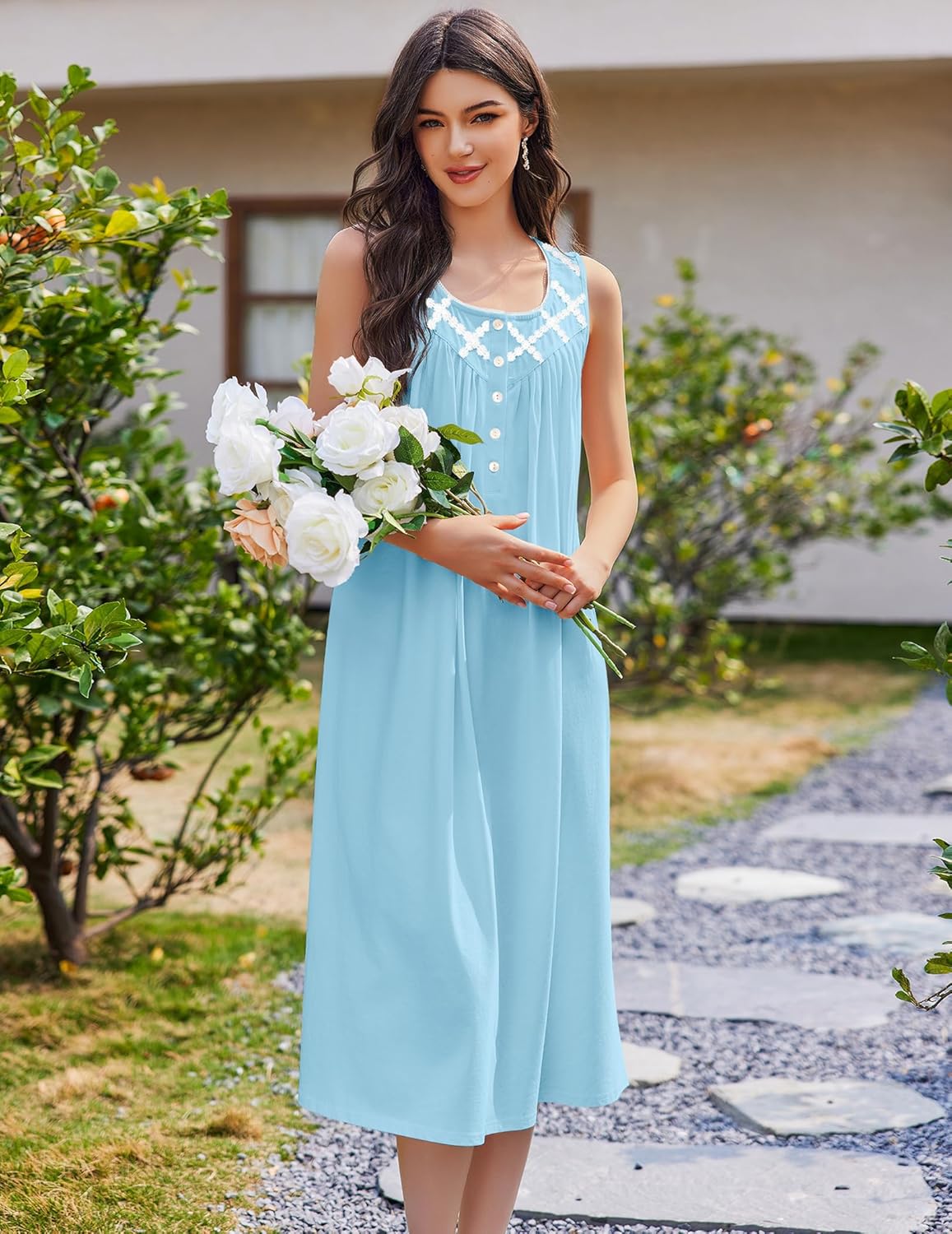 Light blue long sleeveless sleep dress with button front and decorative lace neckline