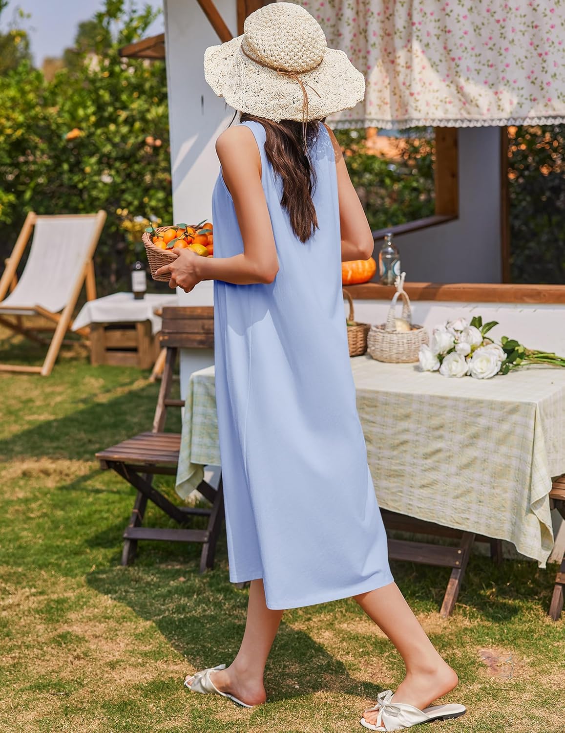Light blue sleeveless nightgown with gathered yoke and ankle-length hem