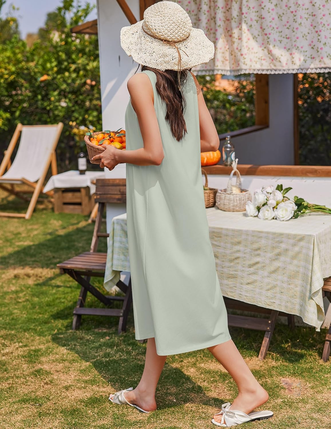 Cotton sleeveless nightgown, light green with white trim at round neck and button closure