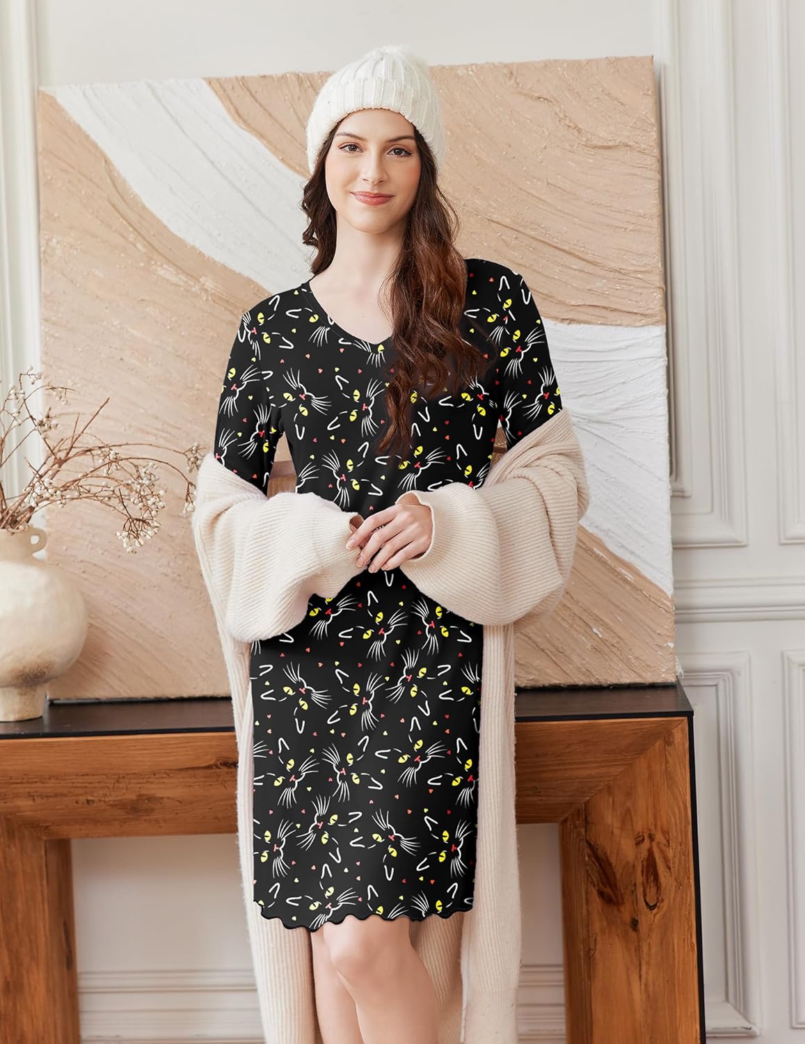 Long-sleeve cotton nightgown in black with colorful small cat pattern and scalloped hem