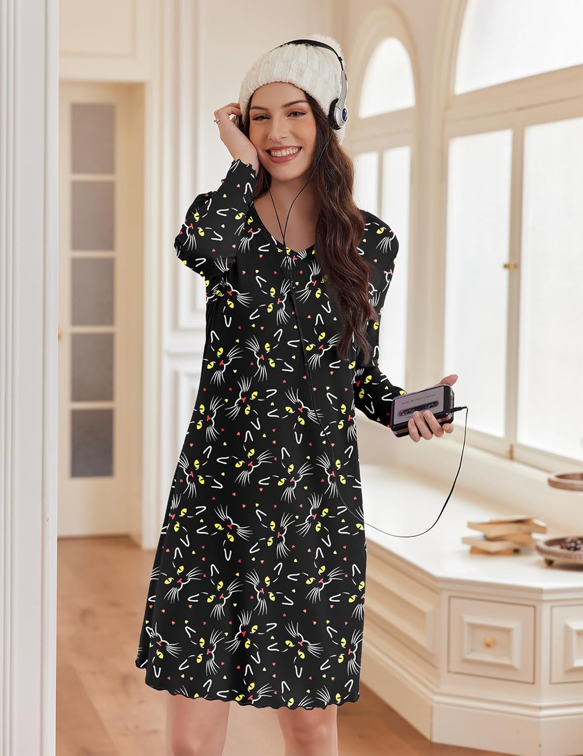 Cotton nightgown, long sleeve, black with colorful cat-themed print and scalloped hem