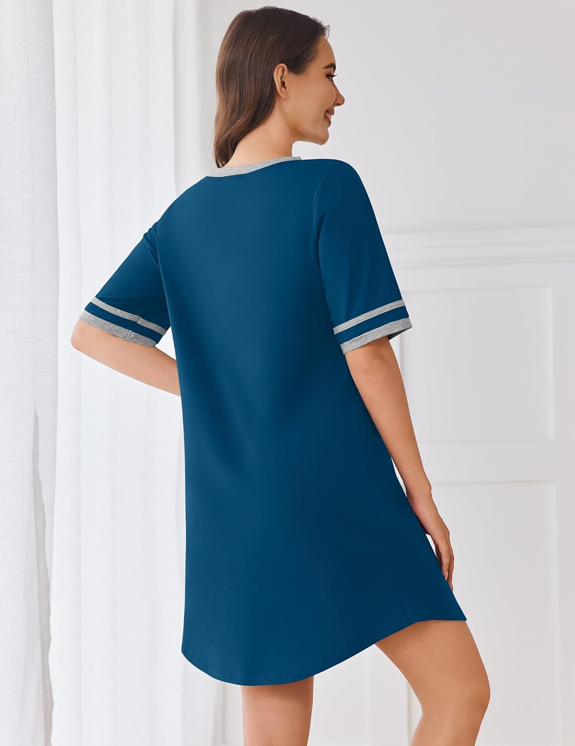 Teal-blue cotton nightgown with white striped sleeve cuffs, short sleeves, back view