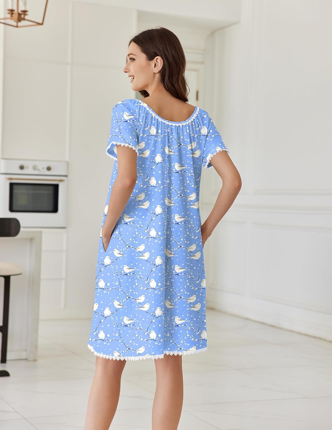 Back view light blue cotton sleep dress with white print and lace-trim hem