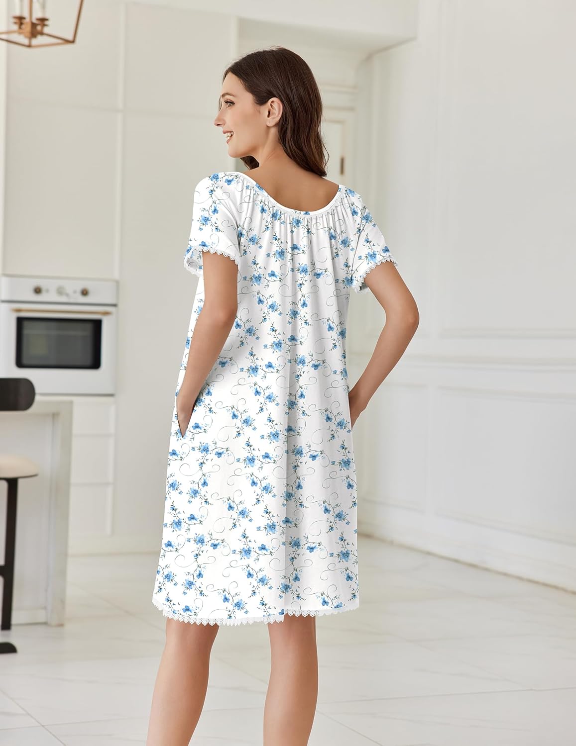 Back view: blue floral cotton nightgown with lace hem and short flutter sleeves