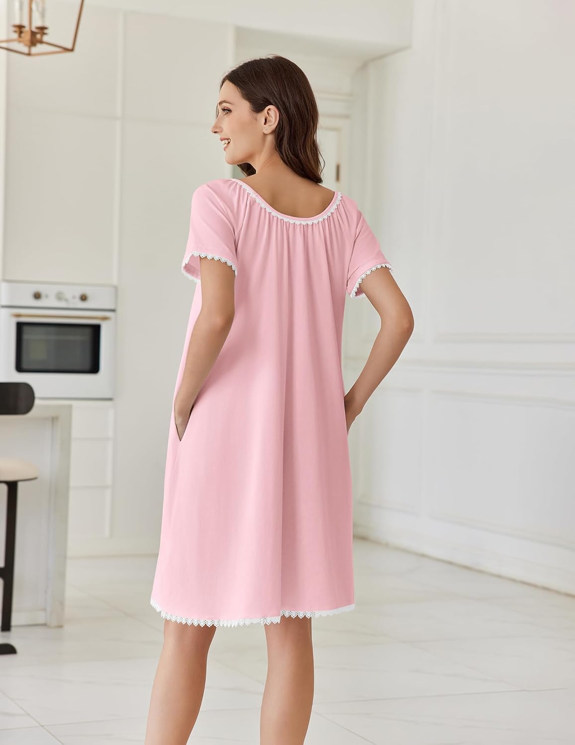 Pink cotton nightgown, back view, short sleeves with lace trim at hem