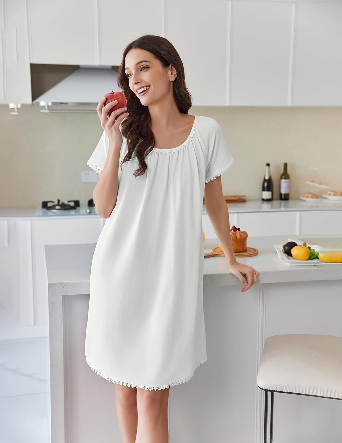 White cotton nightgown, short sleeves, lace-trim neckline and scalloped hem